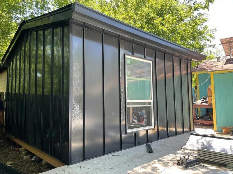 Black standing seam metal wall panels for Roof Inspection in Weddington