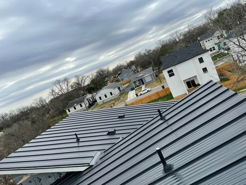 Standing seam metal roof panels with vents for Skylight Repair in Weddington